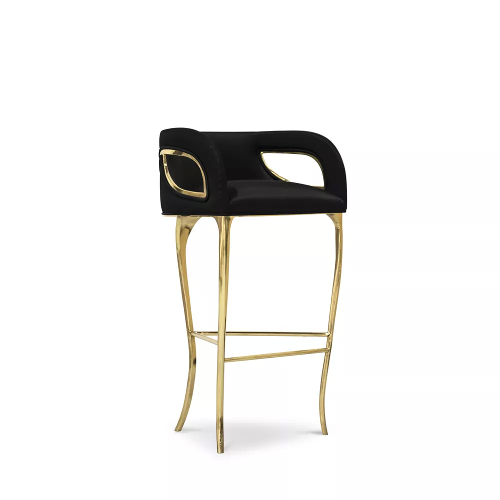 Bar stool upholstered in black with gold finish on the front side view.